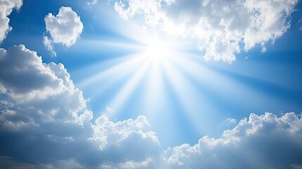 Wall Mural - a bright blue sky with rays of sunlight peeking through clouds, creating a hopeful atmosphere and ro