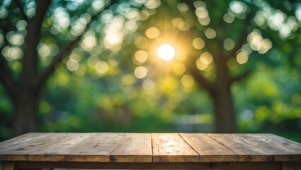 Poster - Wooden tabletop with a blurred background of green trees and sunlit bokeh, perfect for natural and serene outdoor themed visuals.