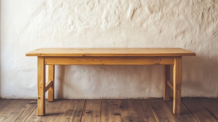 Poster - A minimalist wooden table positioned against a textured white wall, showcasing natural beauty and craftsmanship. Ideal for various interior design themes.