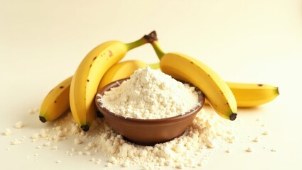 Aufkleber - Tasty bananas alongside a bowl of flour set against a light background.