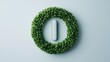 © warunthorn - Green Leafy Wreath with Circular Shape on Minimalistic Background