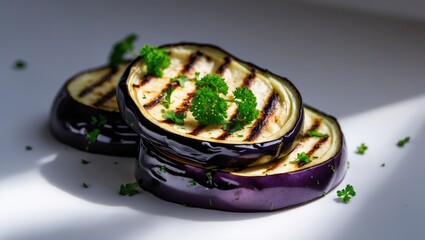 Aufkleber - Grilled eggplant rounds garnished with fresh green parsley, set against a white background.