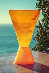 Poster - A yellow vase sits atop a wooden table, perfect for decorative use or as a prop in your scene
