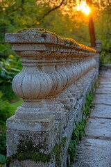 Poster - A rustic stone fence with a beautiful sunset in the background