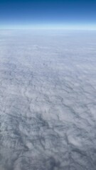 Wall Mural - Vertical Blue Sky and Cloud View from airplane