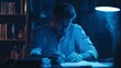 © Andrew - Concentration at Night: A focused individual engrossed in writing or studying at a desk, illuminated by a soft lamp in a dimly lit room.