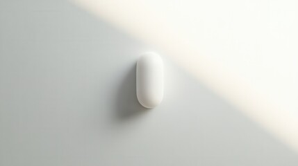 Aufkleber - Single white capsule resting on light gray background with soft shadows showcasing minimalism and hyper realistic detail Generative AI