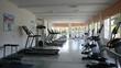 © Anak - A spacious and well lit fitness center with exercise equipment