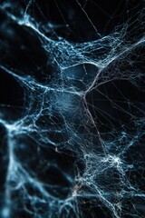Intricate blue spider web with dark background abstract macro photography