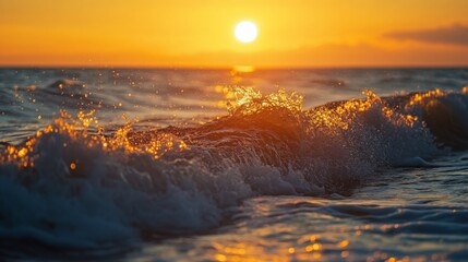 Poster - A time-lapse effect of the sun setting over the ocean, casting golden light over the waves.