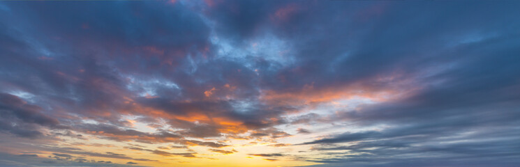 Wall Mural - beautiful blue sky with a pinkish orange sunset
