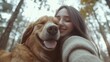 © Khmel - Woman joyfully embraces golden retriever in forest setting