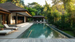 © Howie - Minimalist tropical villa with pool and garden, embodying serene simplicity and harmony.