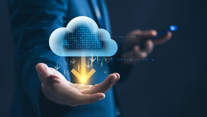 Leinwandbilder - Cloud computing and data management. businessman presents a glowing cloud computing with a download symbol, representing cloud based storage, secure file transfer, and digital business innovation.