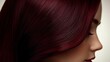 © Pichamon - Close-up of silky red hair in profile view.