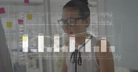 Aufkleber - Analyzing data charts and graphs, businesswoman working in modern office