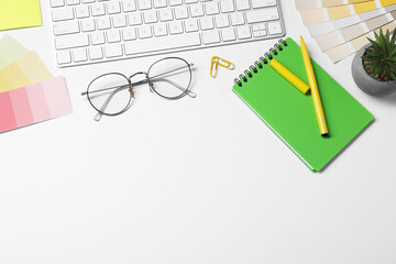 Aufkleber - Designer's workplace with keyboard and stationery on light background, flat lay. Space for text