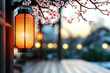 © Artsby - Illuminated Japanese lantern hanging under blooming cherry blossom tree at dusk, serene garden setting; ideal for tranquility, peace, or Asian culture themed designs