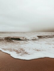 Aufkleber - Lonely seashore with gentle waves under an overcast sky creates a serene atmosphere in an open space Generative AI