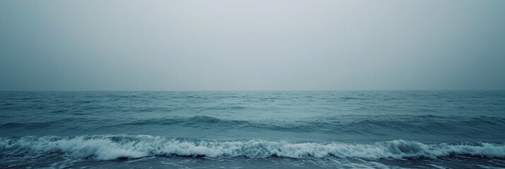 Aufkleber - Lonely seashore under an overcast sky with gentle waves and open space for text Generative AI