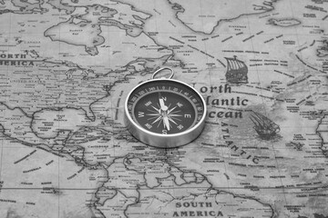 Wall Mural - classic round compass on background of old vintage map of world