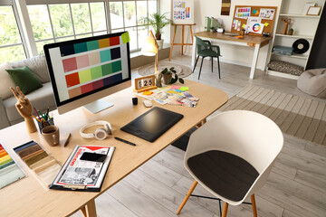Poster - Interior designer's workplace with computer in office