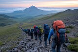 Determined climbers ascend the slopes of Mount Kilimanjaro, showcasing the challenge and beauty of Africa's iconic summit. 