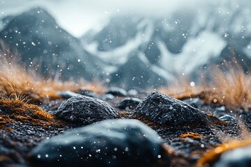 Poster - Scenic winter landscape featuring wet stones surrounded by soft snowflakes and distant snowy mountains : Generative AI
