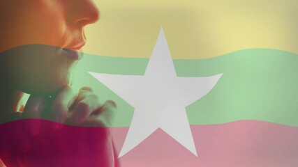 Poster - myanmar flag colors and white star overlaying profile of person in animation
