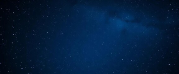 Wall Mural - Vast, deep blue night sky ablaze with countless twinkling stars, glowing softly in the inky blackness, glitter, glowing stars