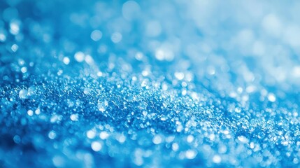 Poster - A soft blue background with faint circular highlights, resembling a bokeh effect.