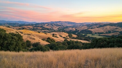 Poster - A serene countryside with rolling hills glowing under the warm orange light of sunset.