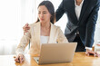© KMPZZZ - Unhappy, disgusted asian young employee, business woman defending hand of colleague man, push out protect when boss touching her body, embrace shoulder. Sexual harassment inappropriate at office work.