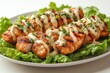© SS Stock - Delicious grilled salmon fillets drizzled with creamy sauce, served on a bed of fresh lettuce. Perfect for healthy meals and culinary delights.