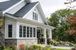 © Serhii - Charming Facade: A House Showcasing Stone Veneer and Classic White Board and Batten Siding with Inviting Front Porch