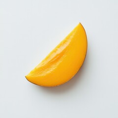 Poster - Ripe mango slice showcasing smooth yellow texture against a clean, light background in natural light