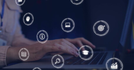  - Image of network of connections with icons over caucasian businessman using laptop