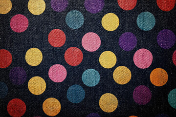 Poster - A dark background with colorful polka dots of varying sizes and shades.