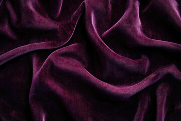 Poster - Luxurious deep purple velvet fabric, dramatically draped and textured.