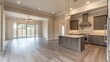 © GRACE - Modern open-concept kitchen and living space with hardwood floors and natural lighting