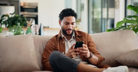 smile, man and relax with phone at house for browsing social media, communication and reading blog. 
