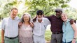 © Rawpixel.com - Diverse group of senior friends smiling and enjoy outdoors. Happy seniors enjoying nature in the park. Diverse group of senior men and women hugging each other at park. Happy old people outdoor