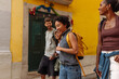 © bernardbodo - Tourists walking and laughing in lisbon, portugal