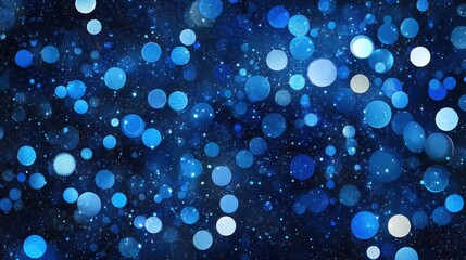 Abstract blue and white bokeh light circle pattern on dark background