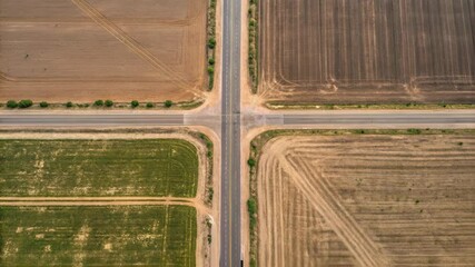 Aufkleber - Aerial landscape revealing agricultural crossroads, showcasing dynamic color and texture transitions through frame by frame stop motion sequence capturing changing rural farmland patterns