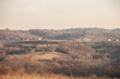 © Jerome - Rolling hills, scattered homes, and leafless trees define this Kosmaj countryside panorama in Serbia. The muted tones and gentle slopes capture a tranquil, rustic setting typical of the region.
