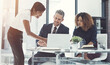 © ThurstanJam/peopleimages.com - Corporate, people and helping on laptop in meeting for brainstorming, project advice and reading report. Staff, discussion and online with financial planning, review budget and investment information