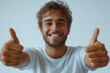 © FJ9 - Man with two thumbs up smiling face happy successful isolated on white background