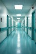 © Thitipa - Blurred hospital hallway, sterile white walls, muted tones, abstract, treatment, ceiling