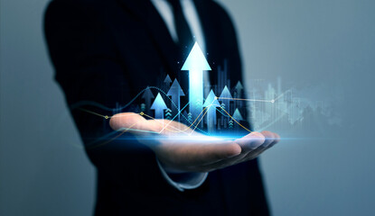 Poster - Businessman holding finance growth and graph chart diagram and analysing sale data.Analysis finance grow graph and market investment. Business strategy and data on economic growth graph chart.